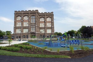 June 19, 2018

Space to Grow, Nathan Davis Elementary School in Chicago, Davis Elementary is the first schoolyard transformation to be completed by the Space to Grow program in 2018 and the 10th overall, playground and schoolyard ribbon cutting ceremony,stormwater management, green infrastructure, native plantings, playground equipment and turf field, permeable surfaces, porous surfaces, public amenities and recreation, kids and children playing, President Mariyana T. Spyropoulos, Commissioners Debra Shore, Ken Dunkan, David Walsh, Kari K. Steele, Healthy Schools Campaign, Openlands, City of Chicago Department of Water Management, Chicago Public Schools, Chicago 12th Ward Alderman  George Cardenas, Brighton Park neighborhood of Chicago, Space to Grow, green infrastructure, SPACE TO GROW: GREENING CHICAGO SCHOOLYARDS Space to Grow is an innovative program led by Healthy Schools Campaign and Openlands to transform Chicago schoolyards into vibrant outdoor spaces that benefit students, community members and the environment. Schoolyard renovations prioritize physical activity, play, learning, exploration and community engagement. The green schoolyards also incorporate landscape features that capture a significant amount of rainfall, helping keep the city's water resources clean and resulting in less neighborhood flooding. Space to Grow uses a unique model that brings together capital funds and leadership from Chicago Public Schools, the Chicago Department of Water Management, and the Metropolitan Water Reclamation District of Greater Chicago. Common elements of Space to Grow projects: turf fields for sports and play, play equipment for younger and older students, outdoor classroom areas, rain gardens with native plants, vegetable gardens, benches and seating throughout.